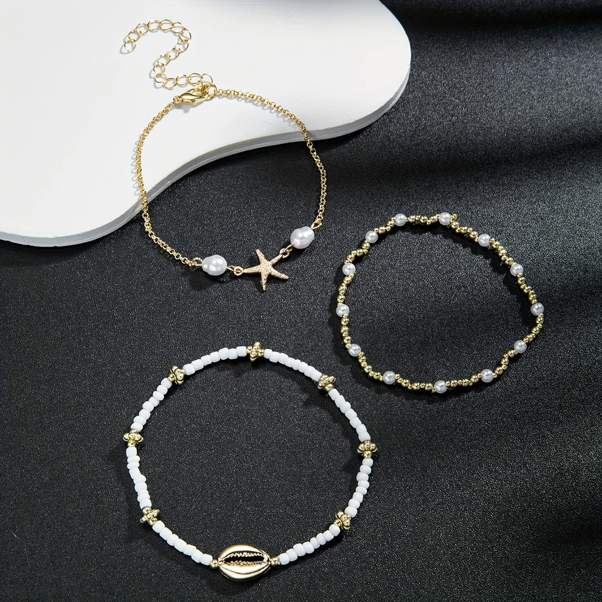 Women's Bohemian Style Beach Vacation Ankle Chains Three-Layer Foot Accessories with Rice Pearls Seashells And Starfish