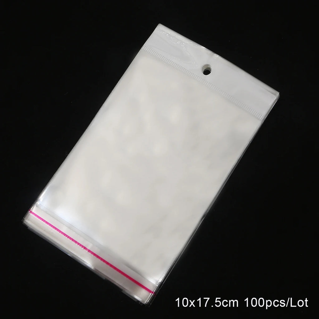 100Pcs 5x10.5cm-8x27cm Opp Bag Self Adhesive Clear Transparent Plastic Storage Bag With Hang Hole Jewelry Gift Packaging Pouches