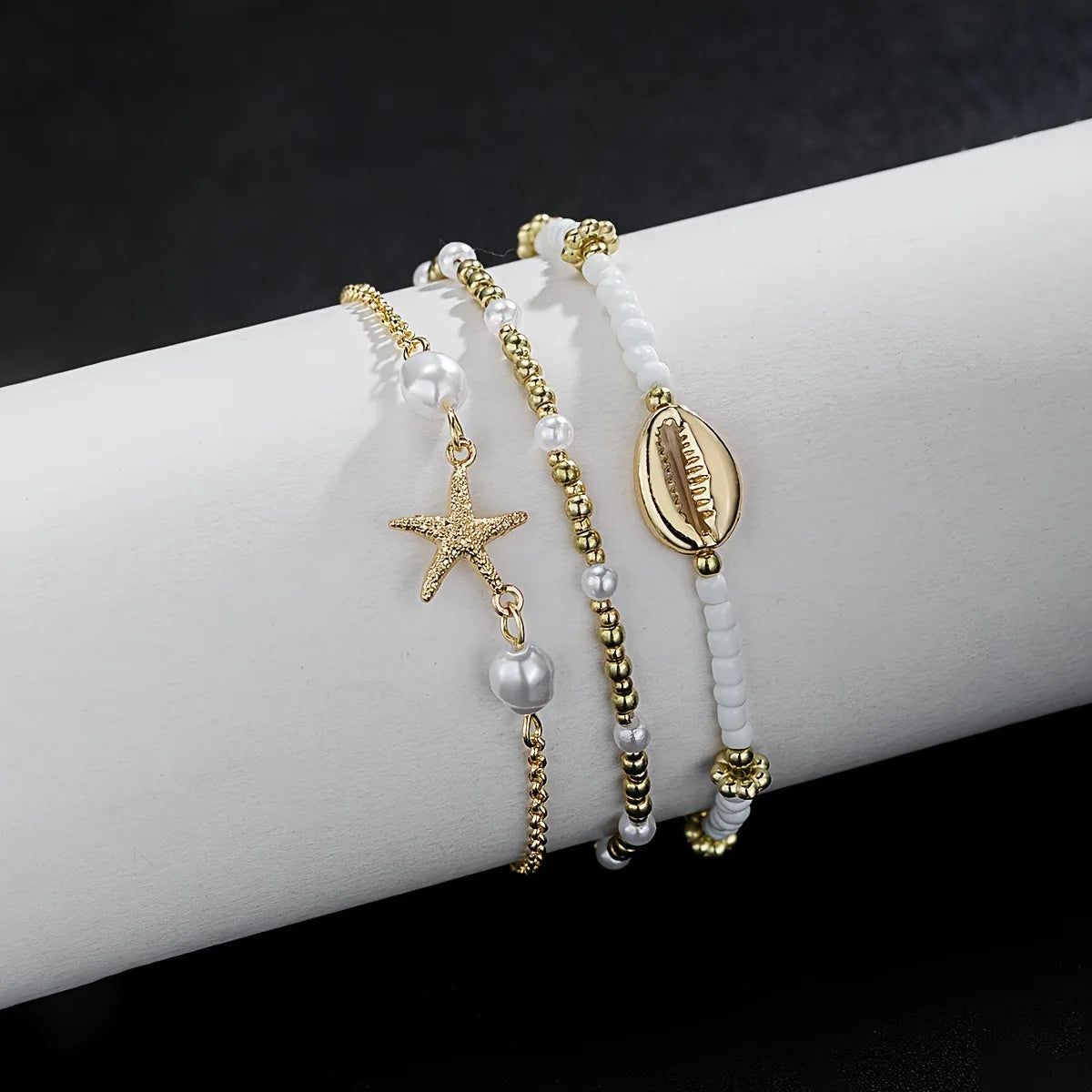 Women's Bohemian Style Beach Vacation Ankle Chains Three-Layer Foot Accessories with Rice Pearls Seashells And Starfish